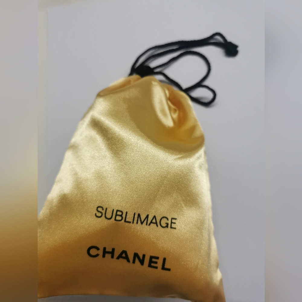 Chanel Makeup Pouch Gold Drawstring Bag. Size 5.1*5.9*1 in"